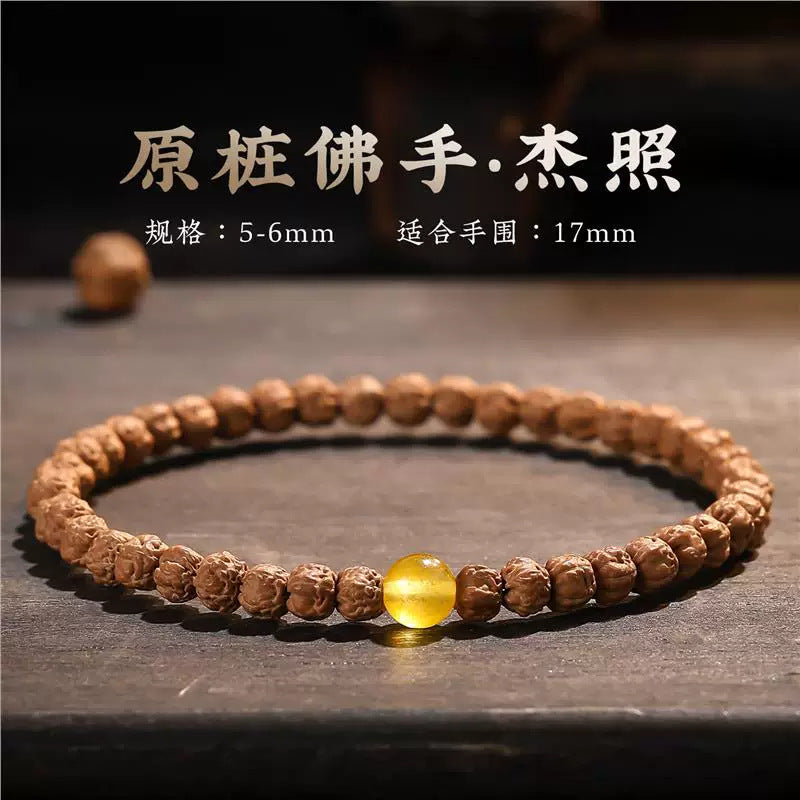 Five-claw Vajra Bodhi bracelet Jiezhao style with 5–6mm textured seed beads and yellow focal bead