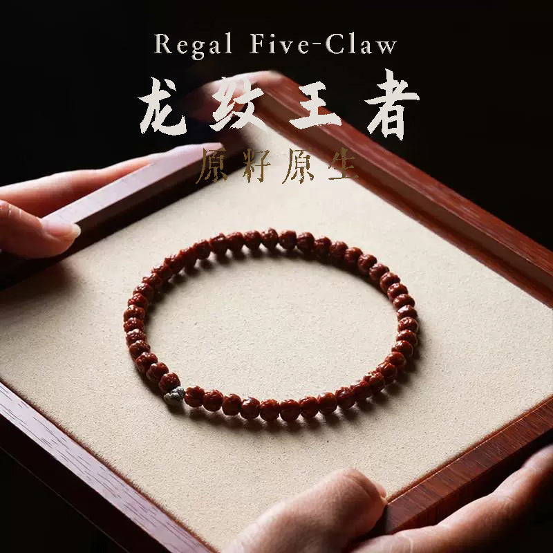 Five-claw Vajra Bodhi-style bracelet with deep reddish-brown polished patina appearance