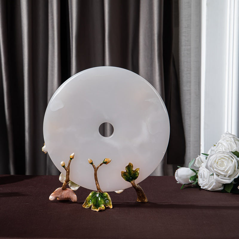 Back view of white bi disc tabletop decor