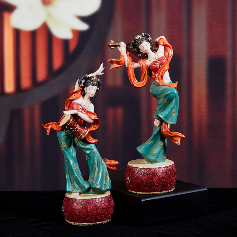 Flying apsara pipa and waist drum figurines with flowing ribbons