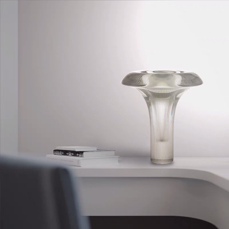 Clear glass mushroom table lamp in modern living room