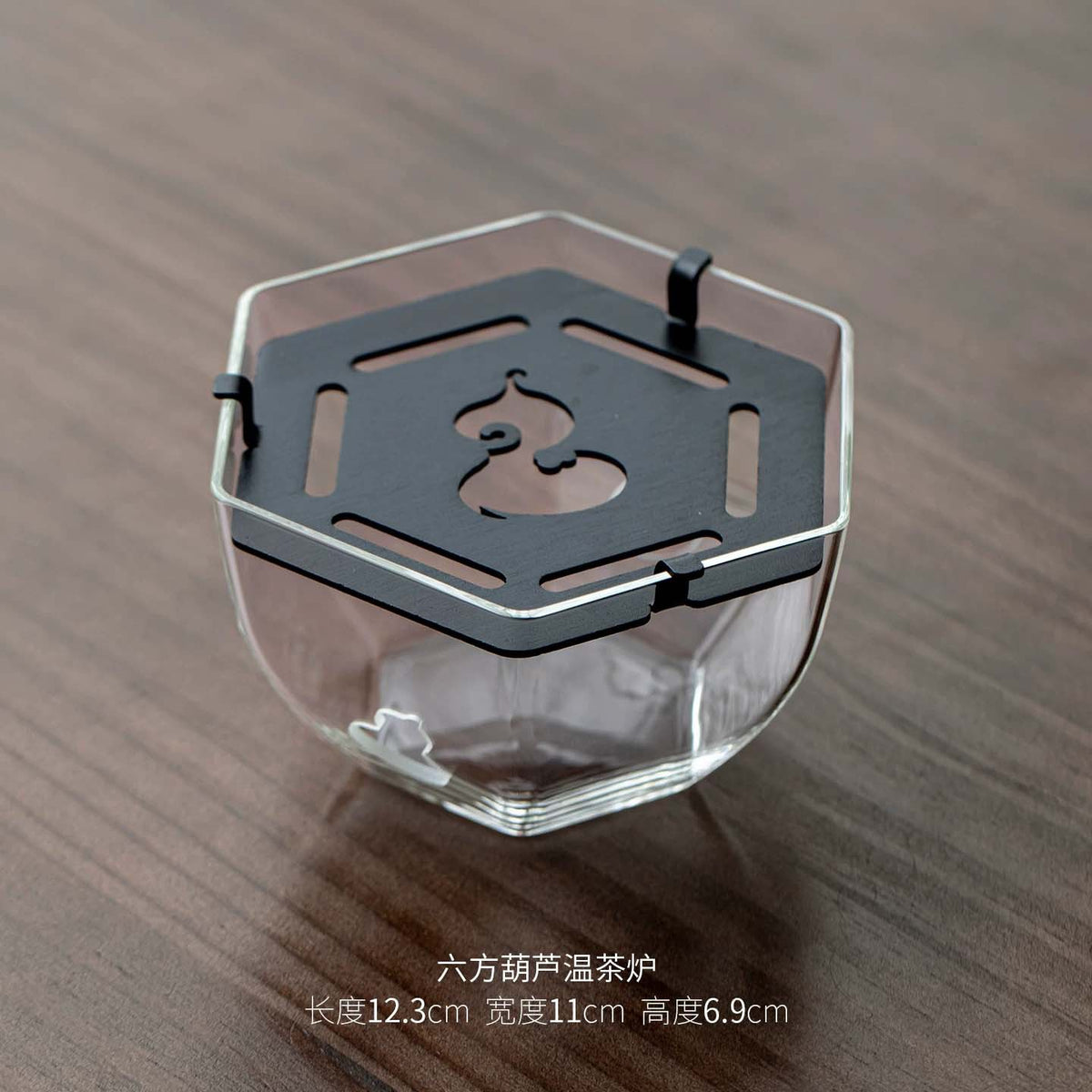 Transparent glass candle warmer with metal support