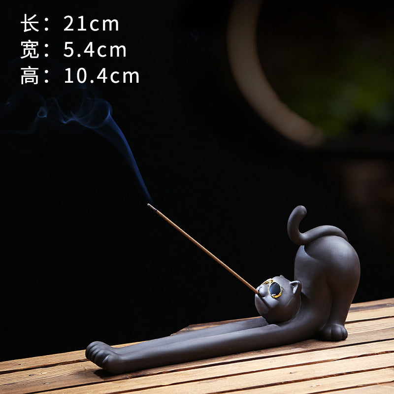 Glasses cat incense holder measuring approximately 21 by 5.4 by 10.4 cm