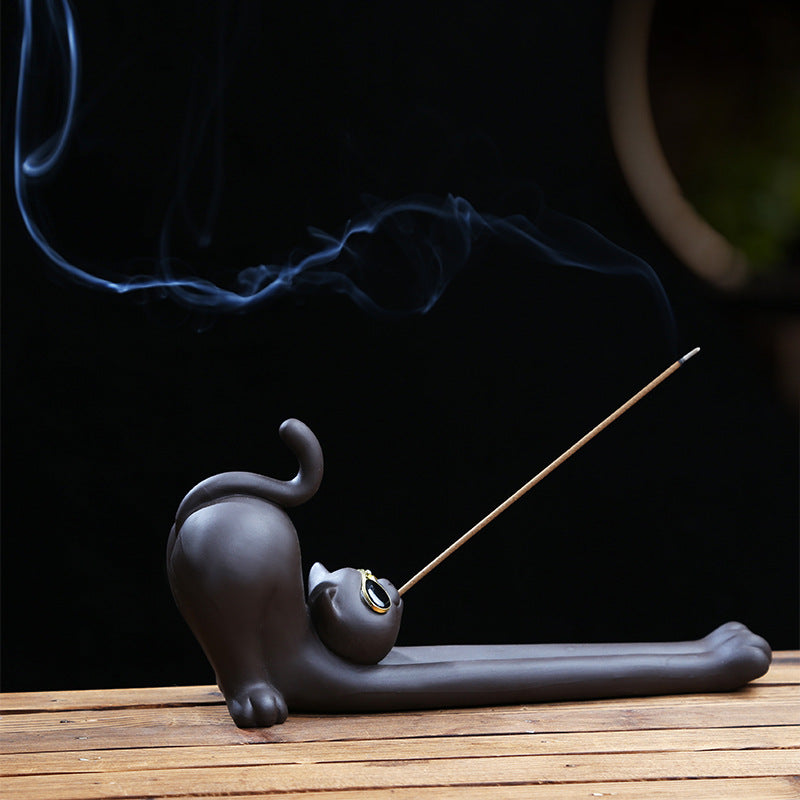 Glasses cat incense stick holder in stretching pose with long ash catcher