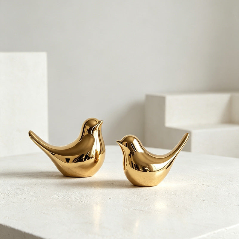 Gold ceramic bird figurine pair for modern luxury shelf decor