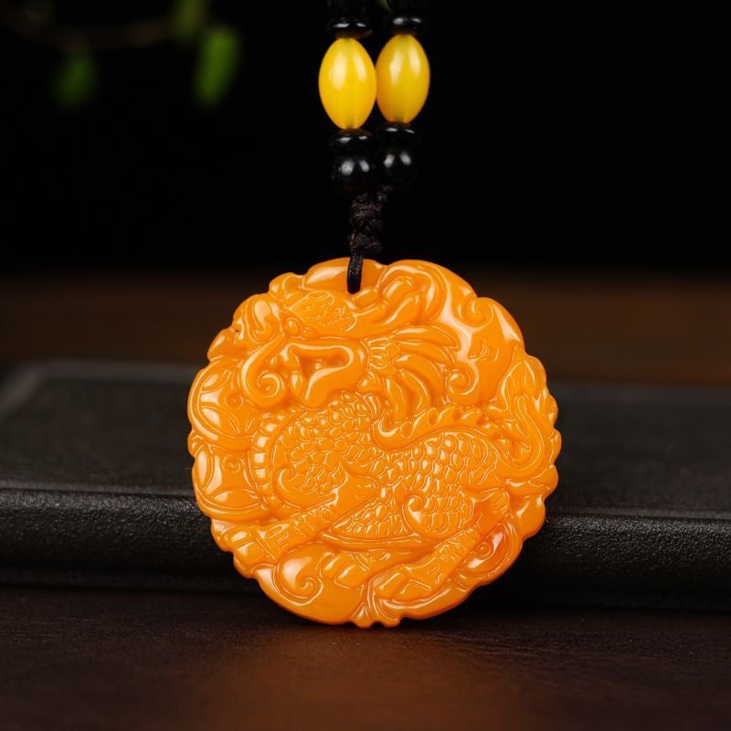 Orange golden Qilin round pendant on dark background