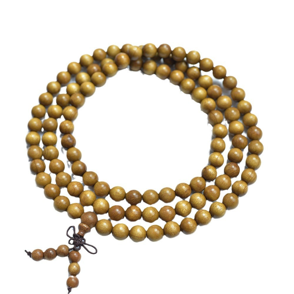 Golden-thread nanmu-style 108-bead mala on a clean white background with gourd-style tail beads