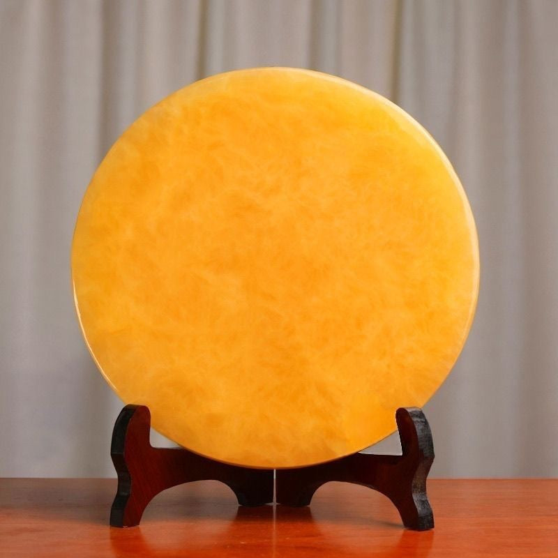 Front view of yellow circular peace decor disc for New Chinese interiors