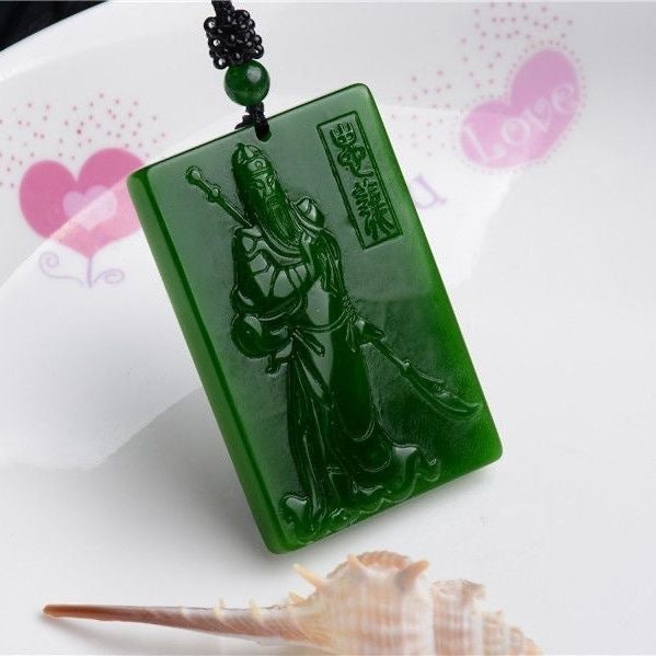 Deep green Guan Yu warrior relief plaque pendant close view