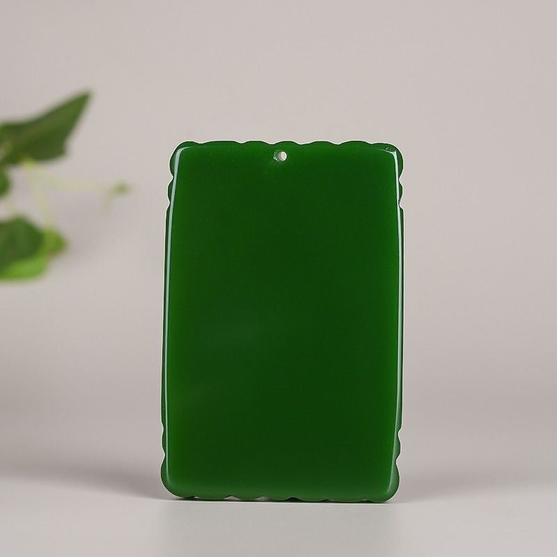 Deep green Guanyin relief pendant smooth reverse side