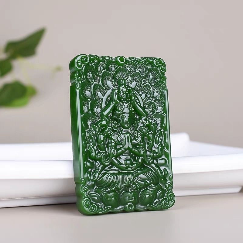 Green Buddhist-inspired Guanyin pendant displayed upright