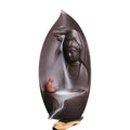 Guanyin leaf-shaped purple clay backflow incense burner with little monk and smoke waterfall