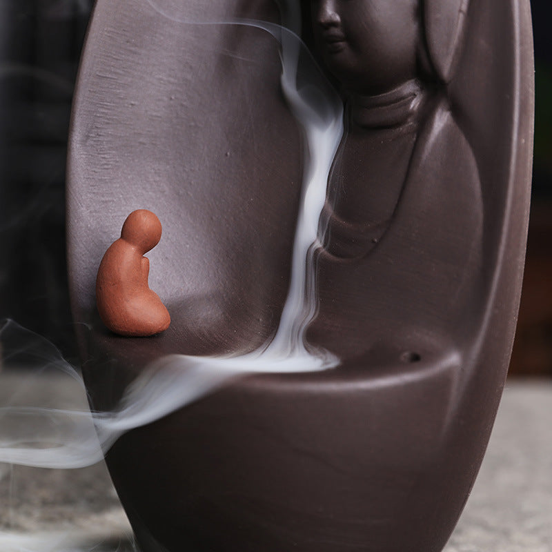 Little monk and descending smoke detail on Guanyin backflow incense burner