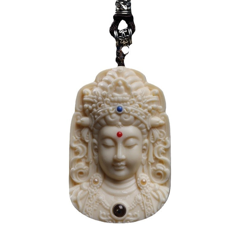 Front view of ivory-tone Guanyin head pendant on white background with ornate crown and decorative accents