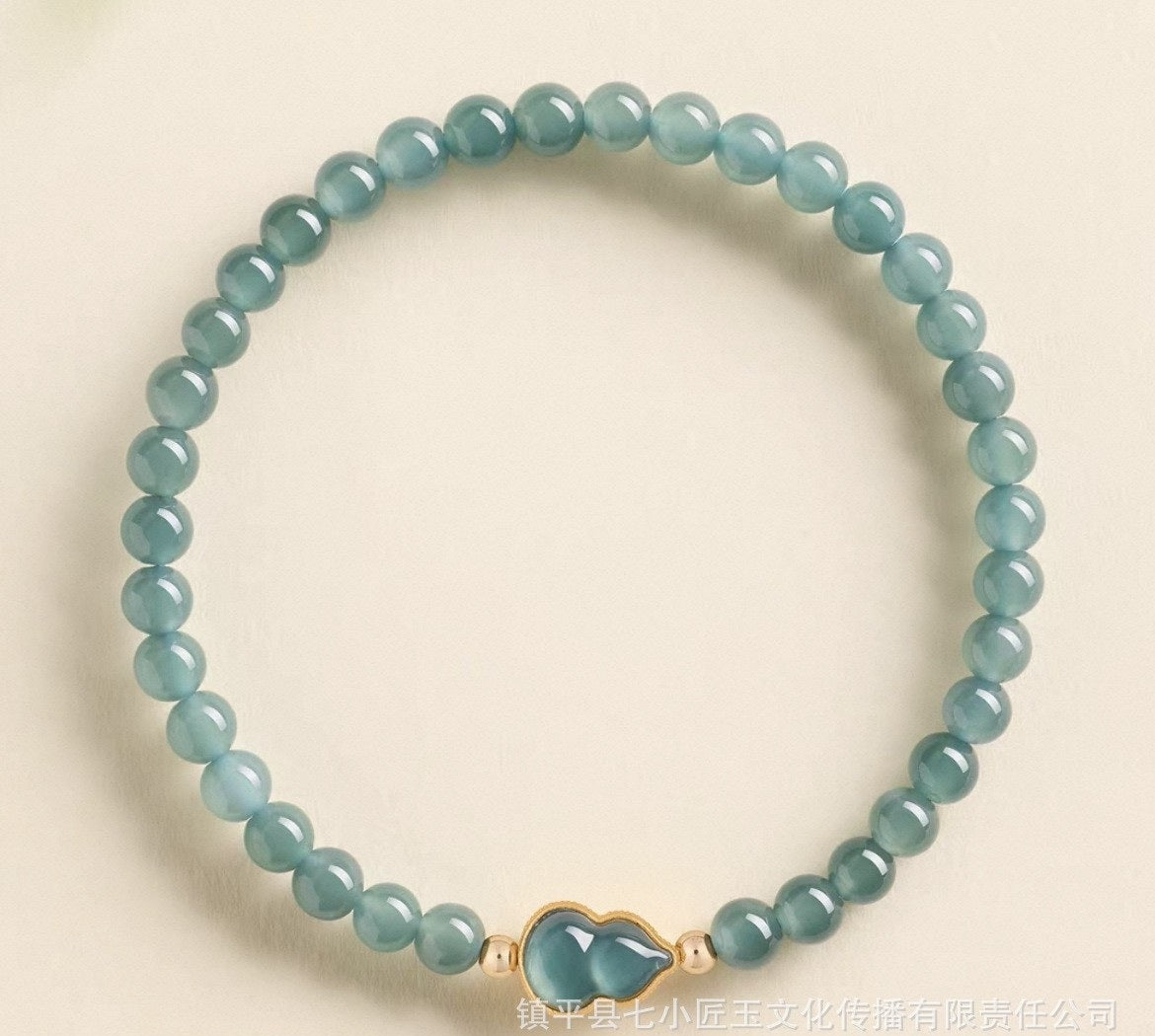 Certified Guatemalan blue water jadeite bead bracelet with polished round beads