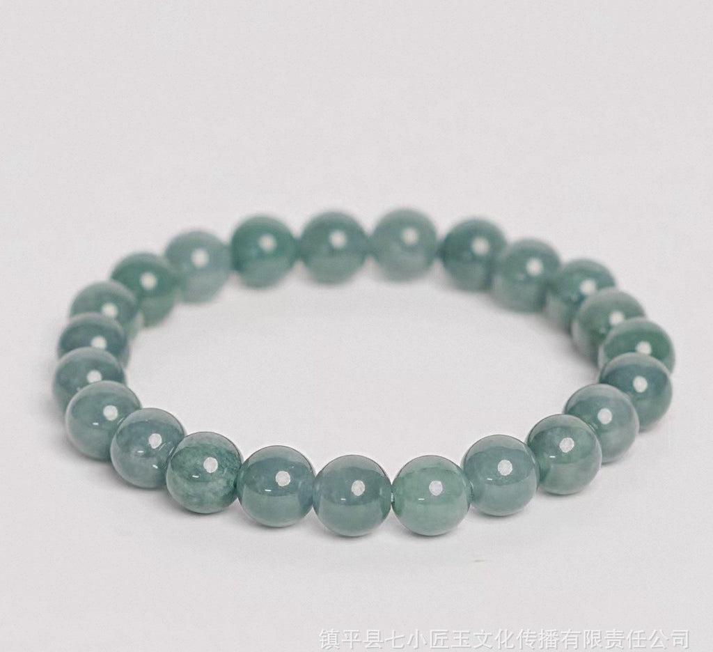 Blue water Guatemalan jadeite bead bracelet in larger round bead size