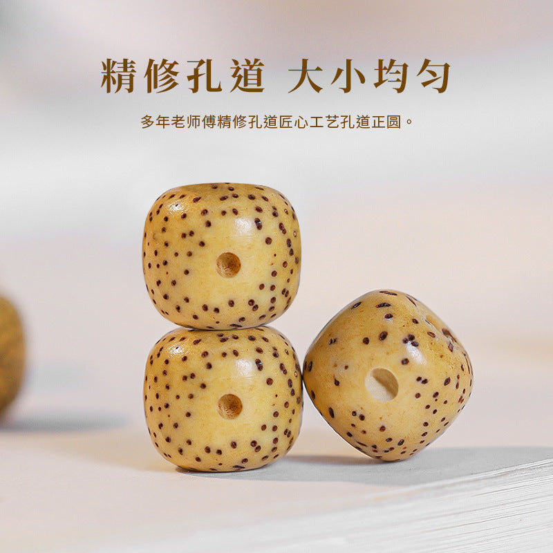 Close-up detail of Hainan Xingyue Star Moon Bodhi seed beads showing natural star and moon patterning