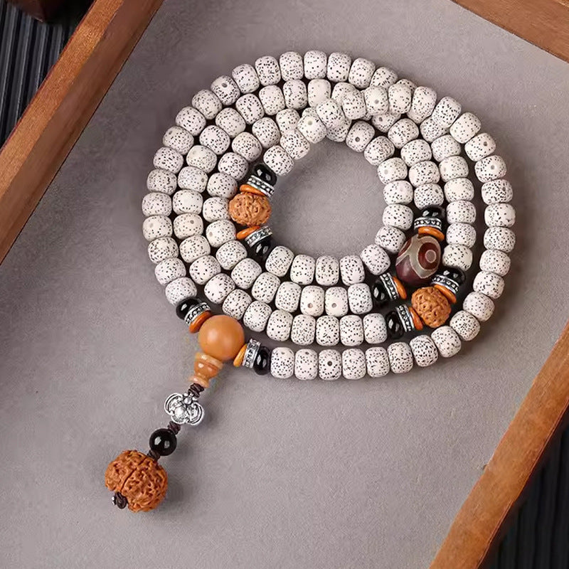 Natural white Hainan Xingyue Star Moon Bodhi long mala with Dzi-style tube and textured seed-tone accents