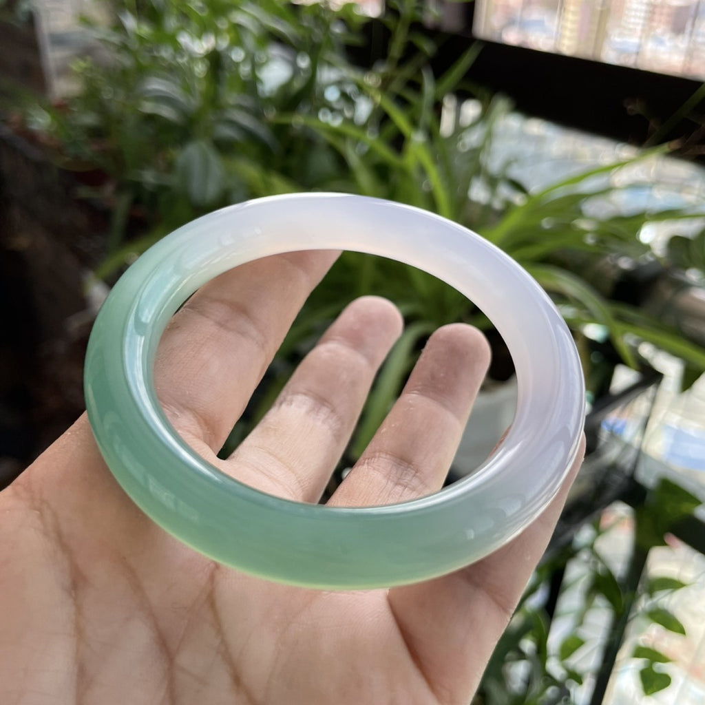 Certified two-tone chalcedony bangle with luminous polished surface