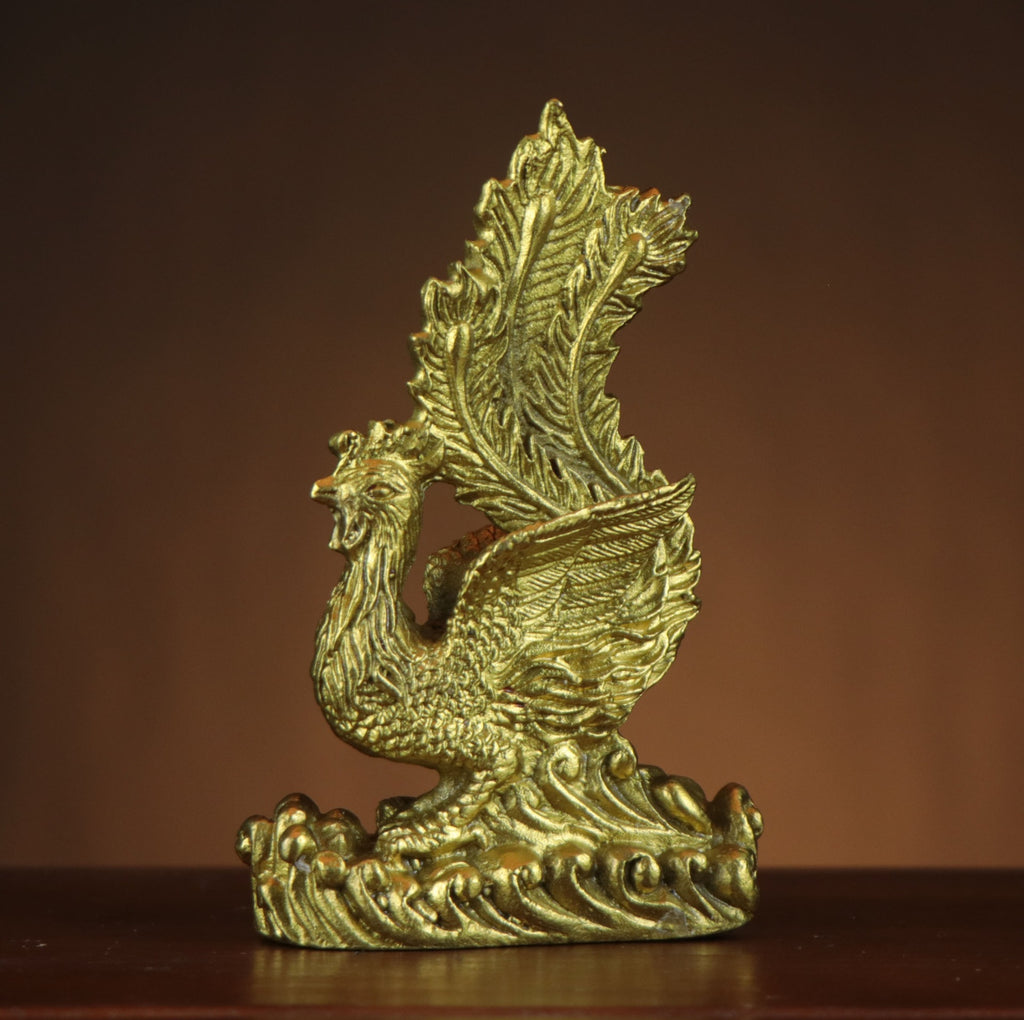 Chinese Han Phoenix Fenghuang copperware sculpture with raised wings and long tail feathers on a stylized wave base for study tea room and office decor