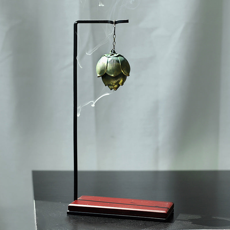 Chinese hanging ceramic incense burner with chain and vented body