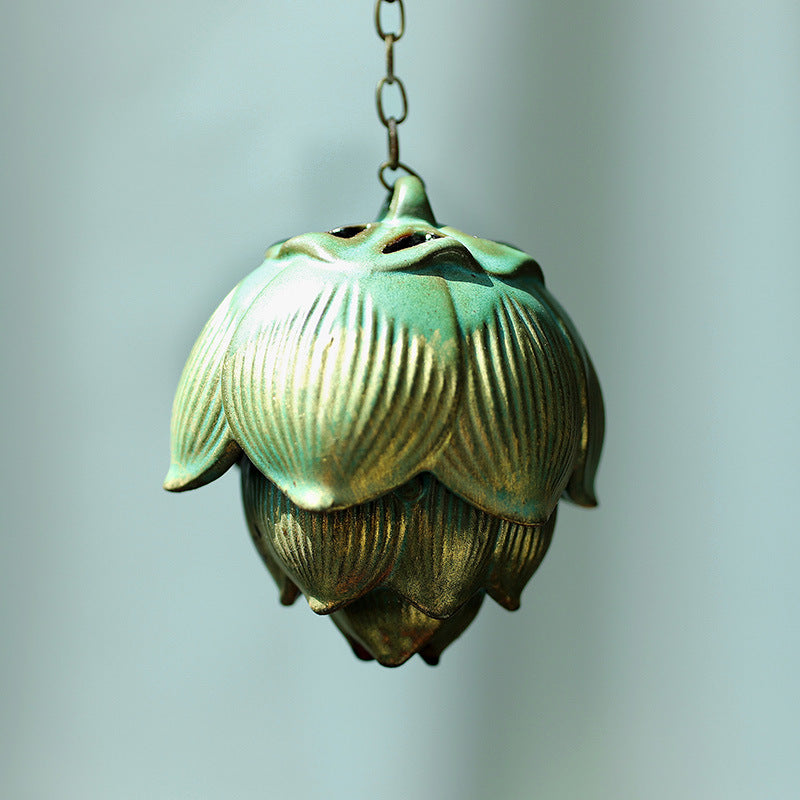 Hanging ceramic lotus incense burner in antique celadon green