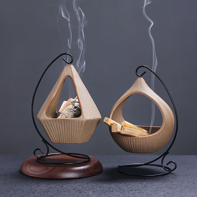 Triangle and teardrop hanging Palo Santo holders shown together