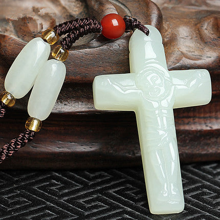 White Hetian jade Christian cross pendant with carved figure detail