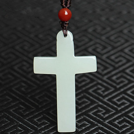 Polished Hetian jade cross pendant 46 by 28 millimeter carving