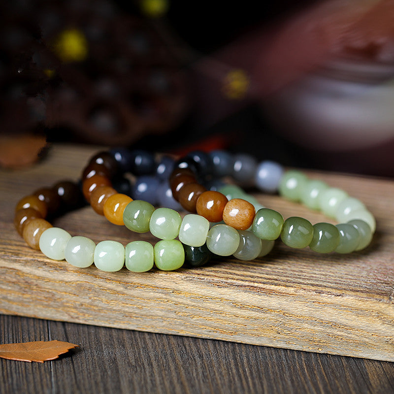 Old-material Hetian jade gradient Duobao barrel beads in green honey and smoky tones
