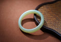Certified natural Hetian jade Qing Shui bangle with pale green nephrite tone