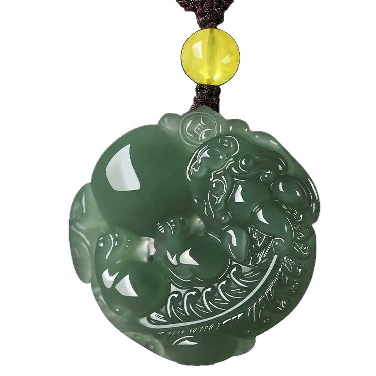 Round carved nephrite Pixiu pendant front detail with polished high points