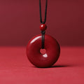High-content cinnabar red safety buckle pendant with black cord