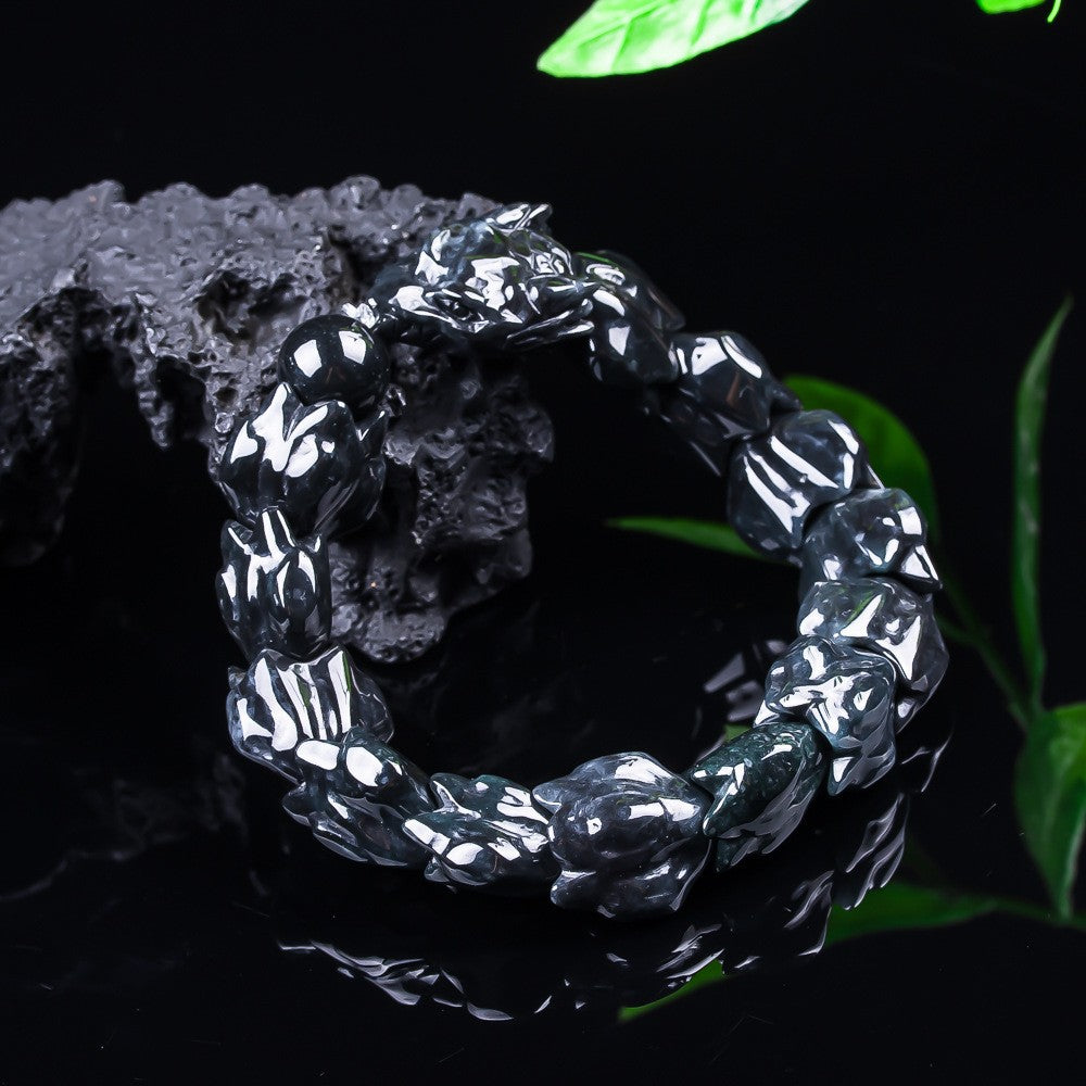 Dark blue green jadeite dragon bone bracelet with carved scale texture