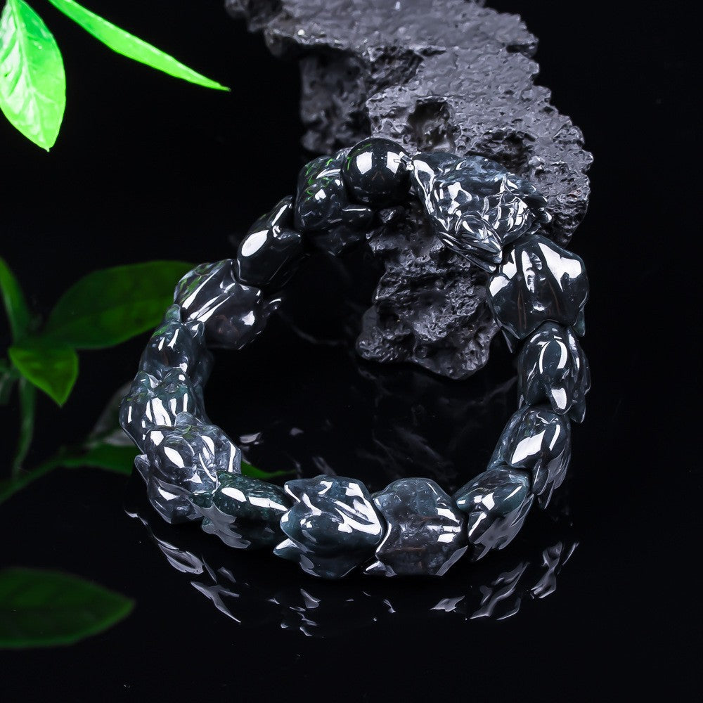 Natural jadeite 16 mm sculptural dragon bracelet close-up