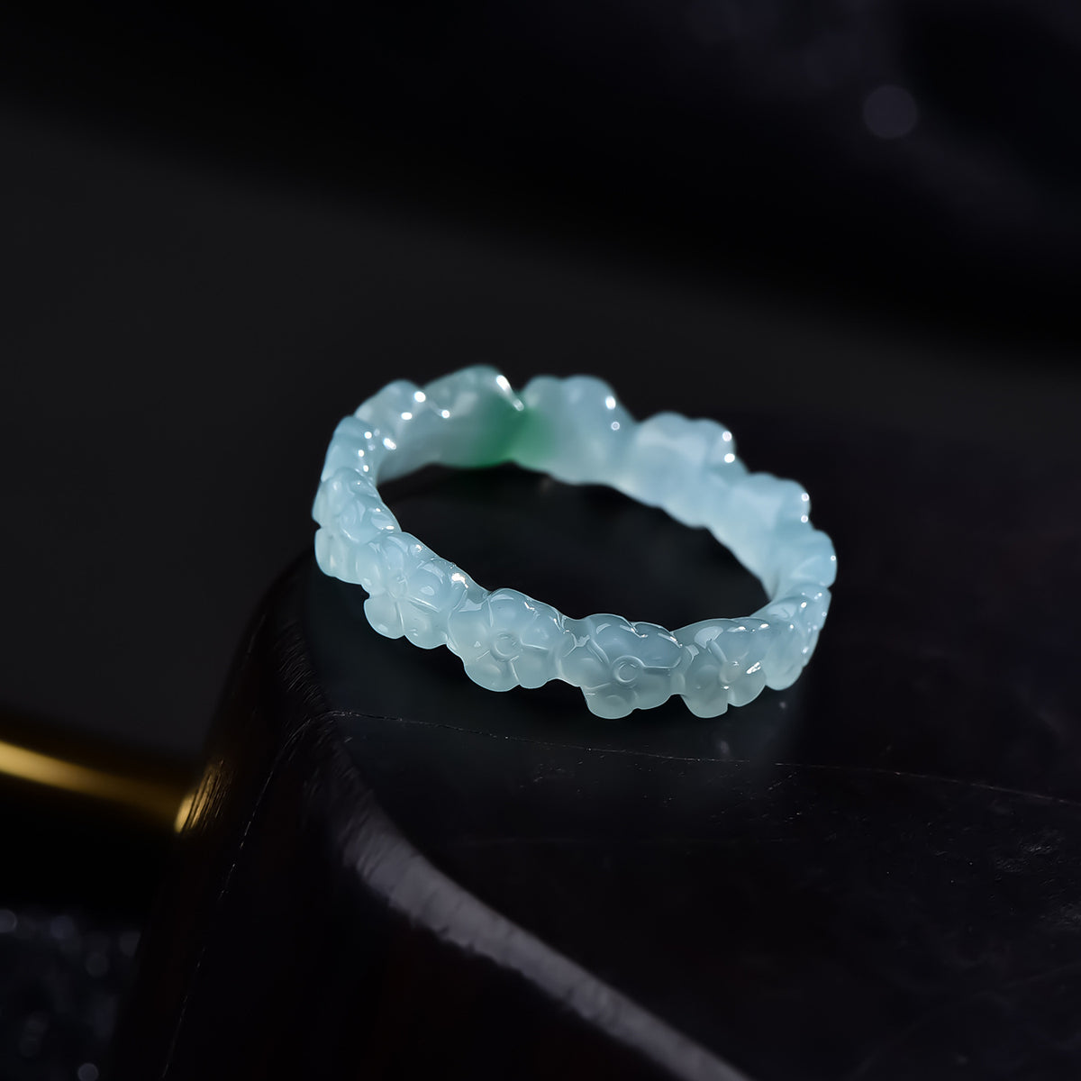 Certified blue green jadeite carved flower ring side view
