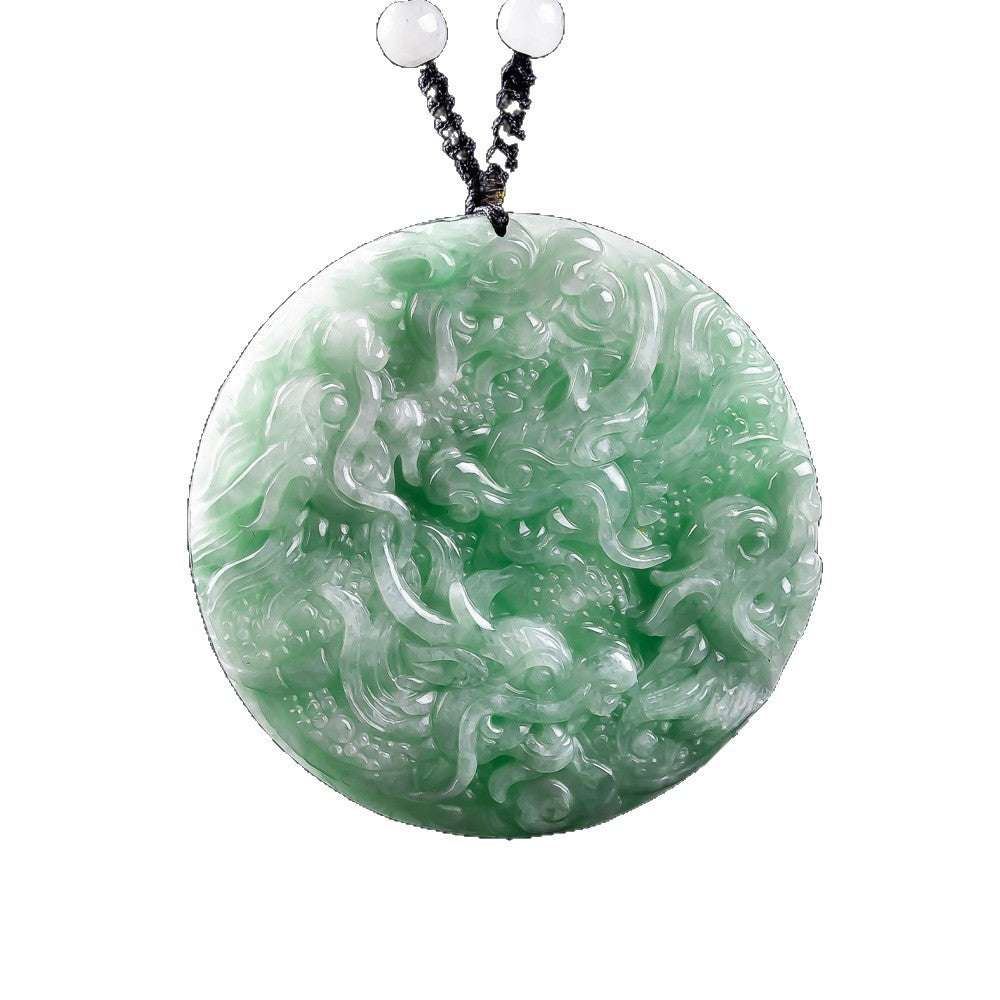 Round jadeite Nine Dragon pendant showing detailed double-sided relief carving