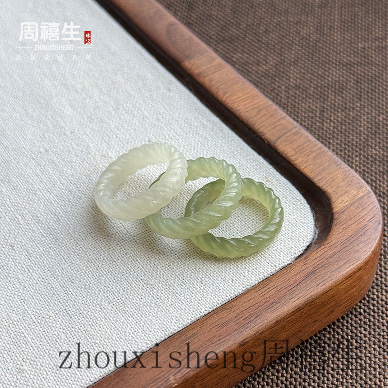 Pale green Hetian jade plain and twist-carved ring styles