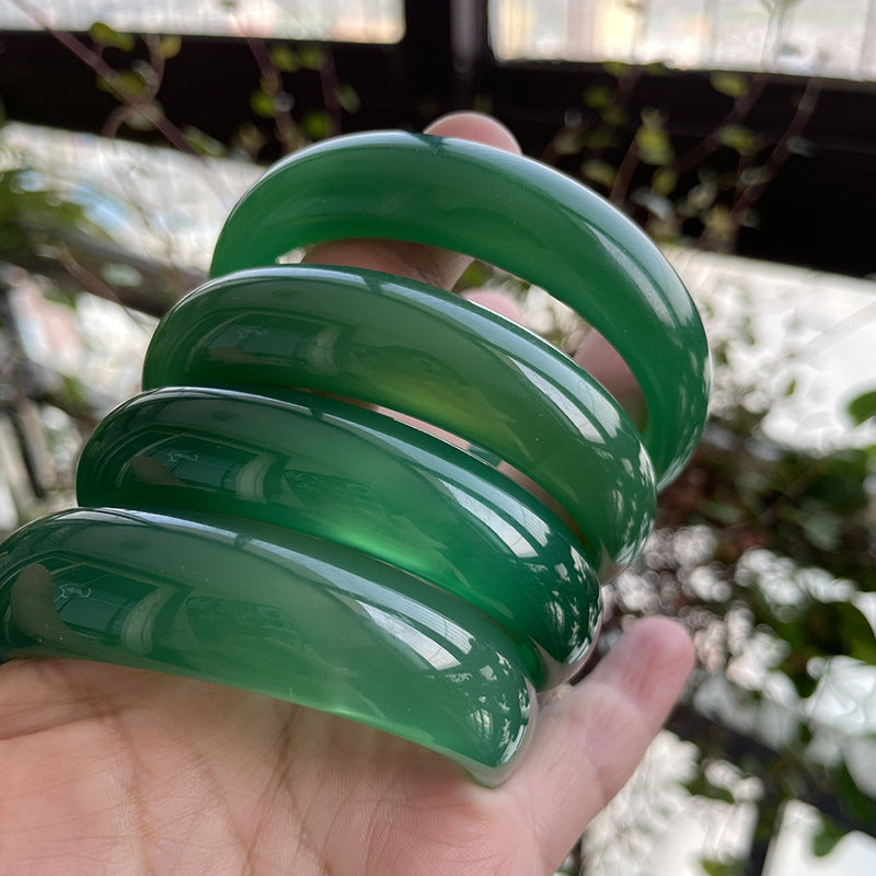Certified vivid green chalcedony wide bangle with deep translucent color