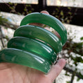Certified vivid green chalcedony wide bangle with deep translucent color