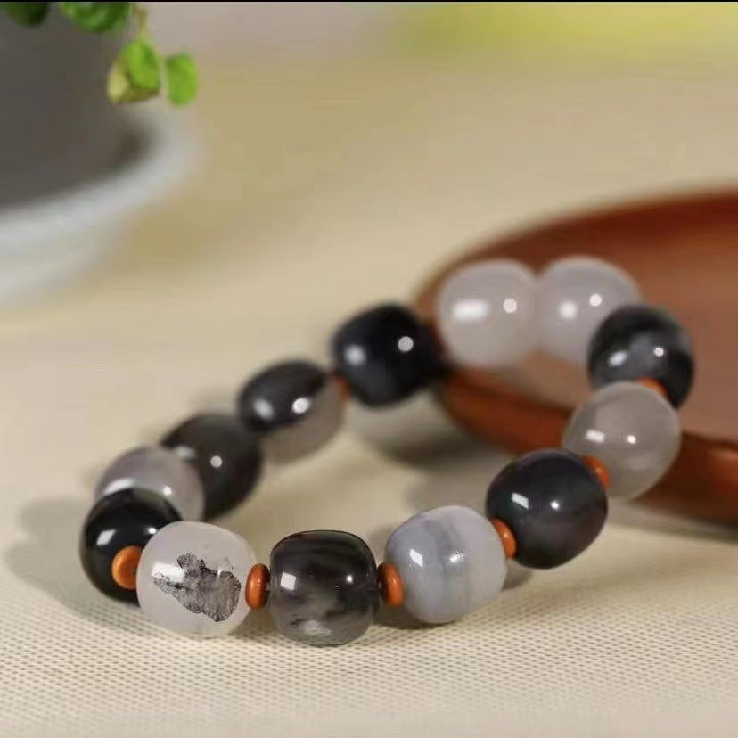 Black grey white polished round bead bracelet with focal bead