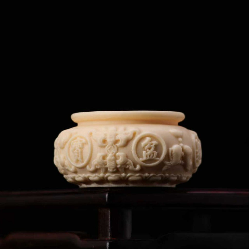 Vegetable ivory cicada carving pendant with detailed wings and natural creamy finish