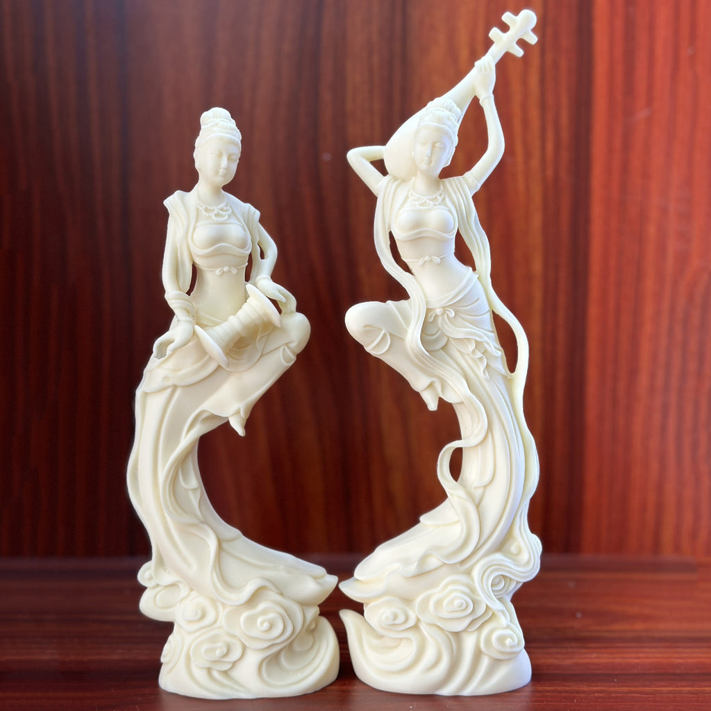 Natural ivory nut Dunhuang apsara musician pair with flowing ribbons and cloud pedestal