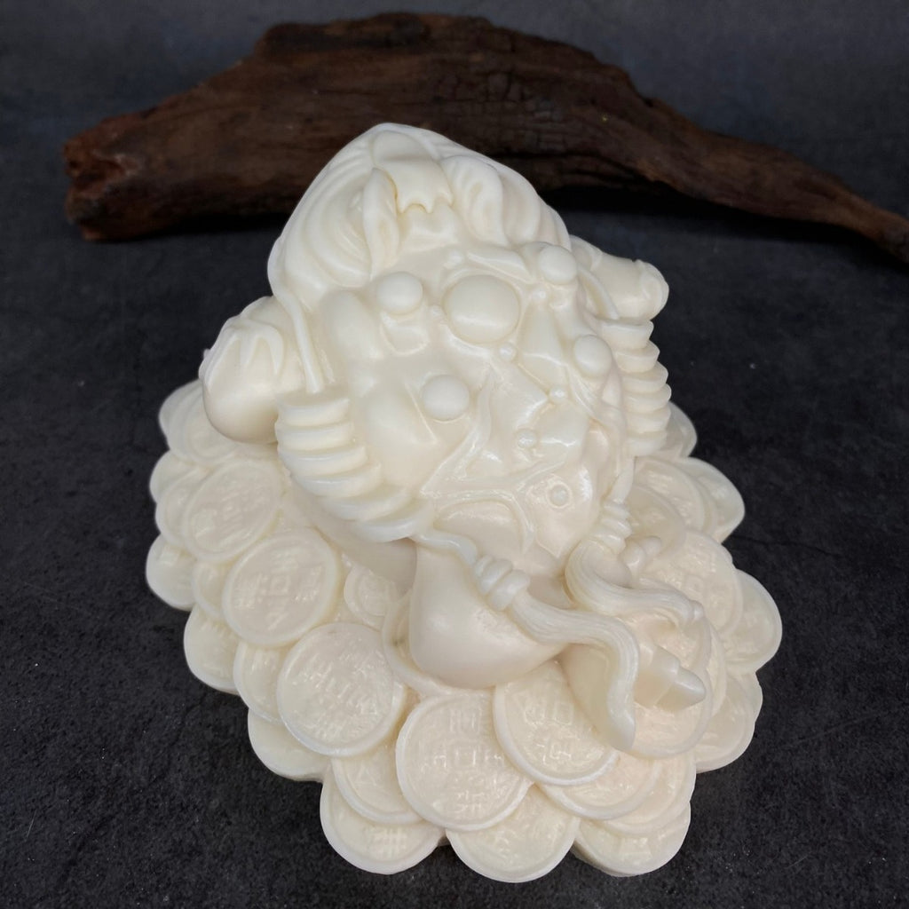Natural ivory nut golden toad figurine with coin base and money bag details
