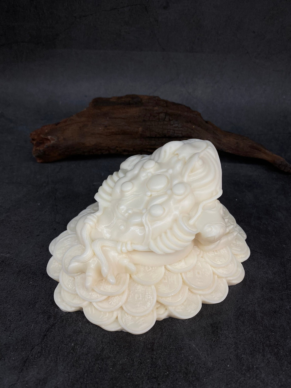 Ivory nut three-legged money toad decorative statue on layered Chinese coin base
