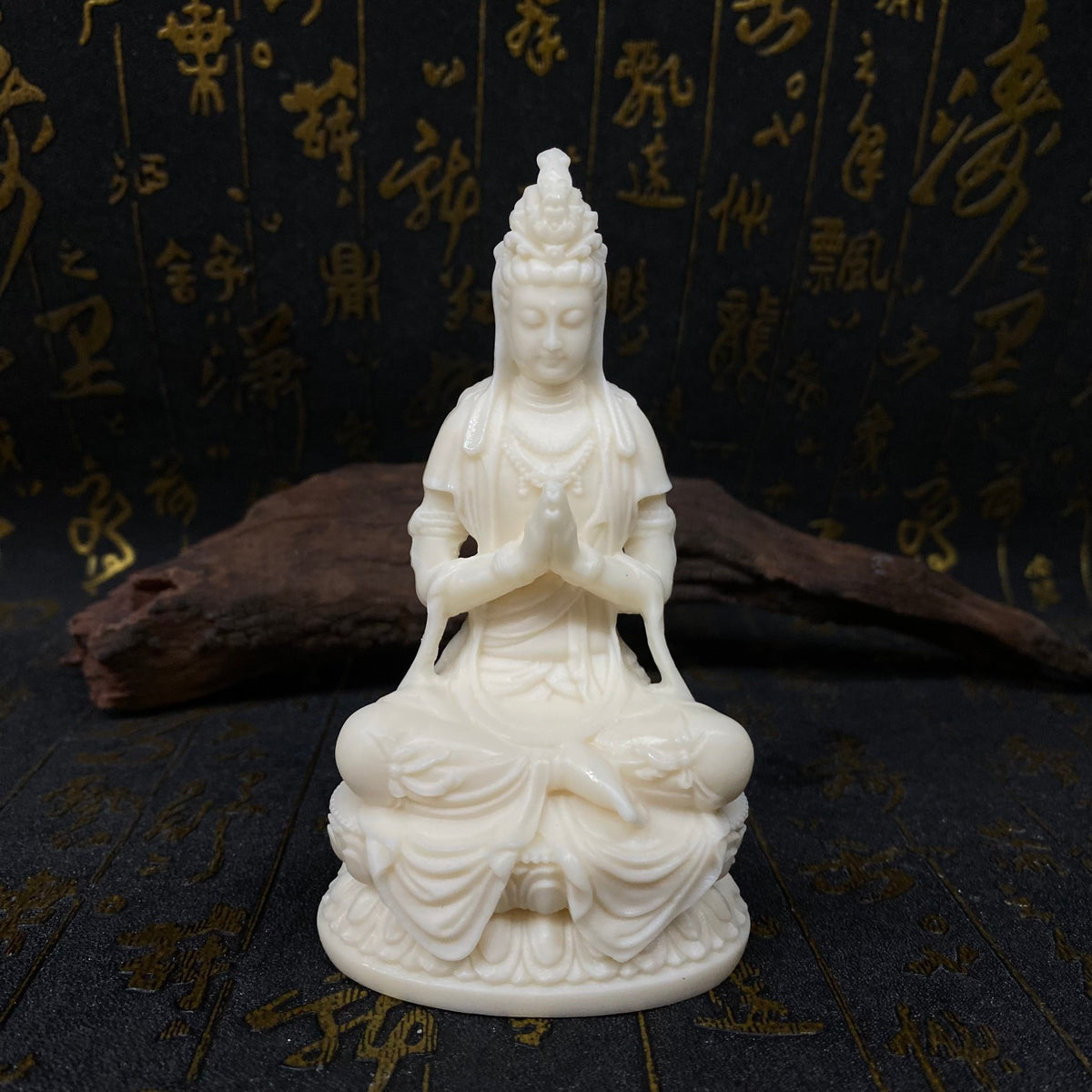 Ivory nut seated Guanyin statue with prayer mudra on lotus pedestal in natural creamy finish