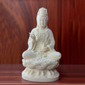 Ivory nut Jingping Guanyin seated on lotus throne in natural creamy finish