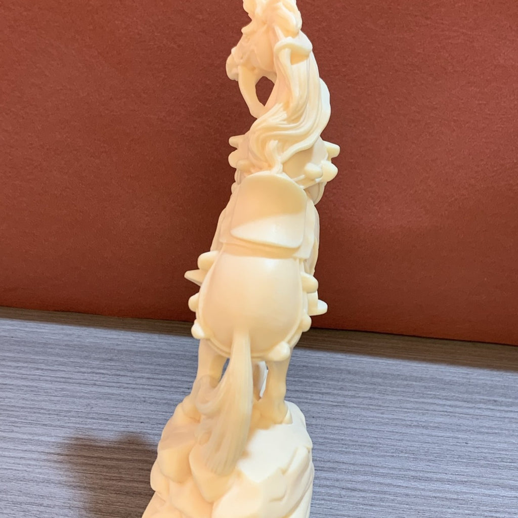 Ivory nut Ma Shang You Qian horse figurine in natural creamy vegetable ivory finish
