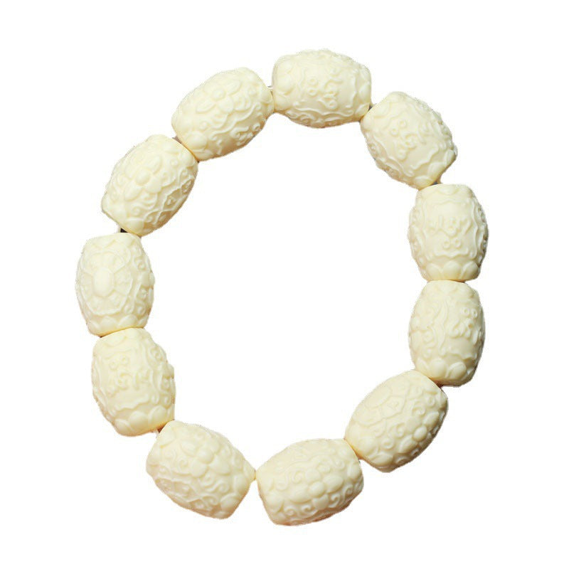 Ivory nut Six-Syllable Mantra relief bead bracelet with oval carved botanical ivory beads