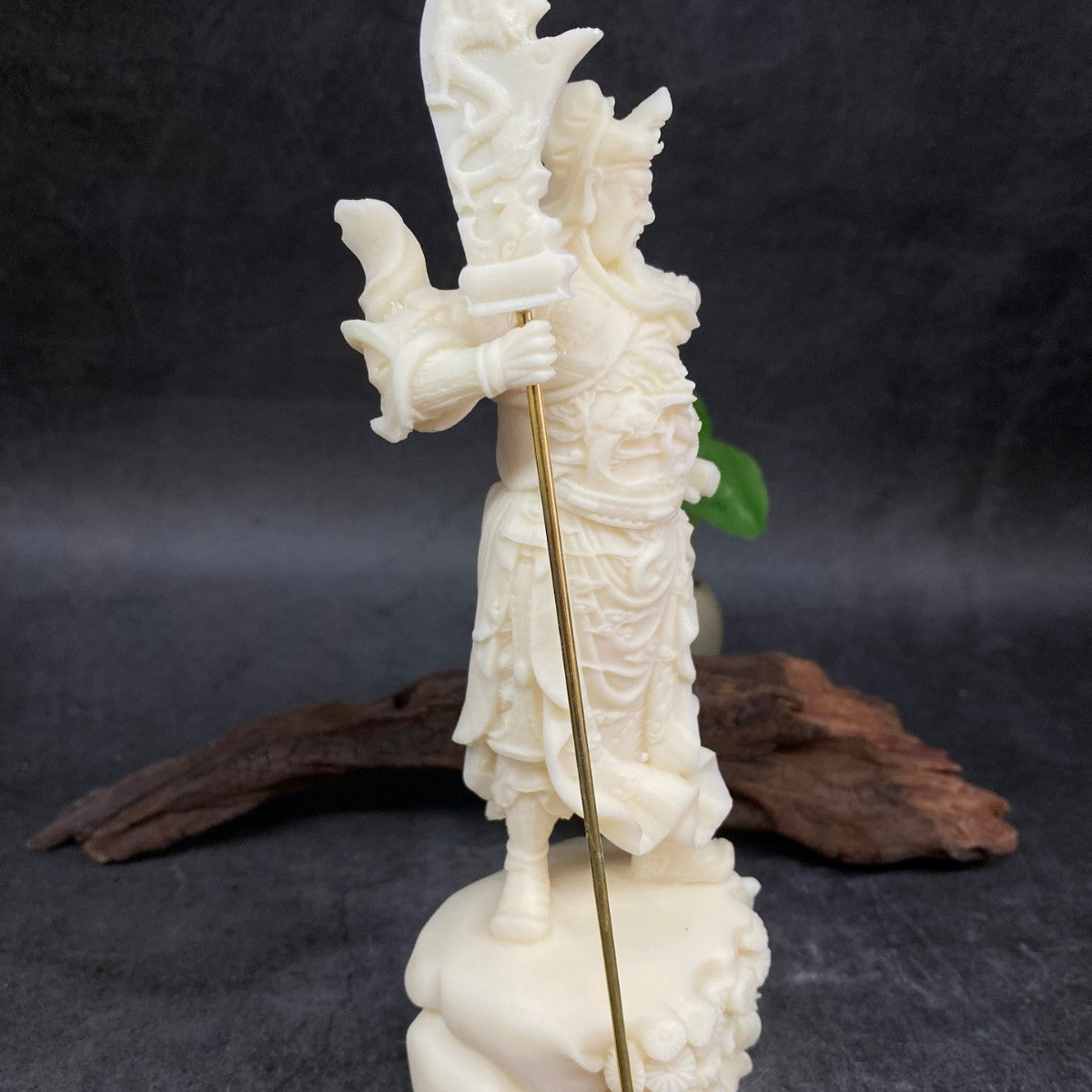 Ivory nut Guan Yu statue three-quarter view with warrior armor, long beard and guandao